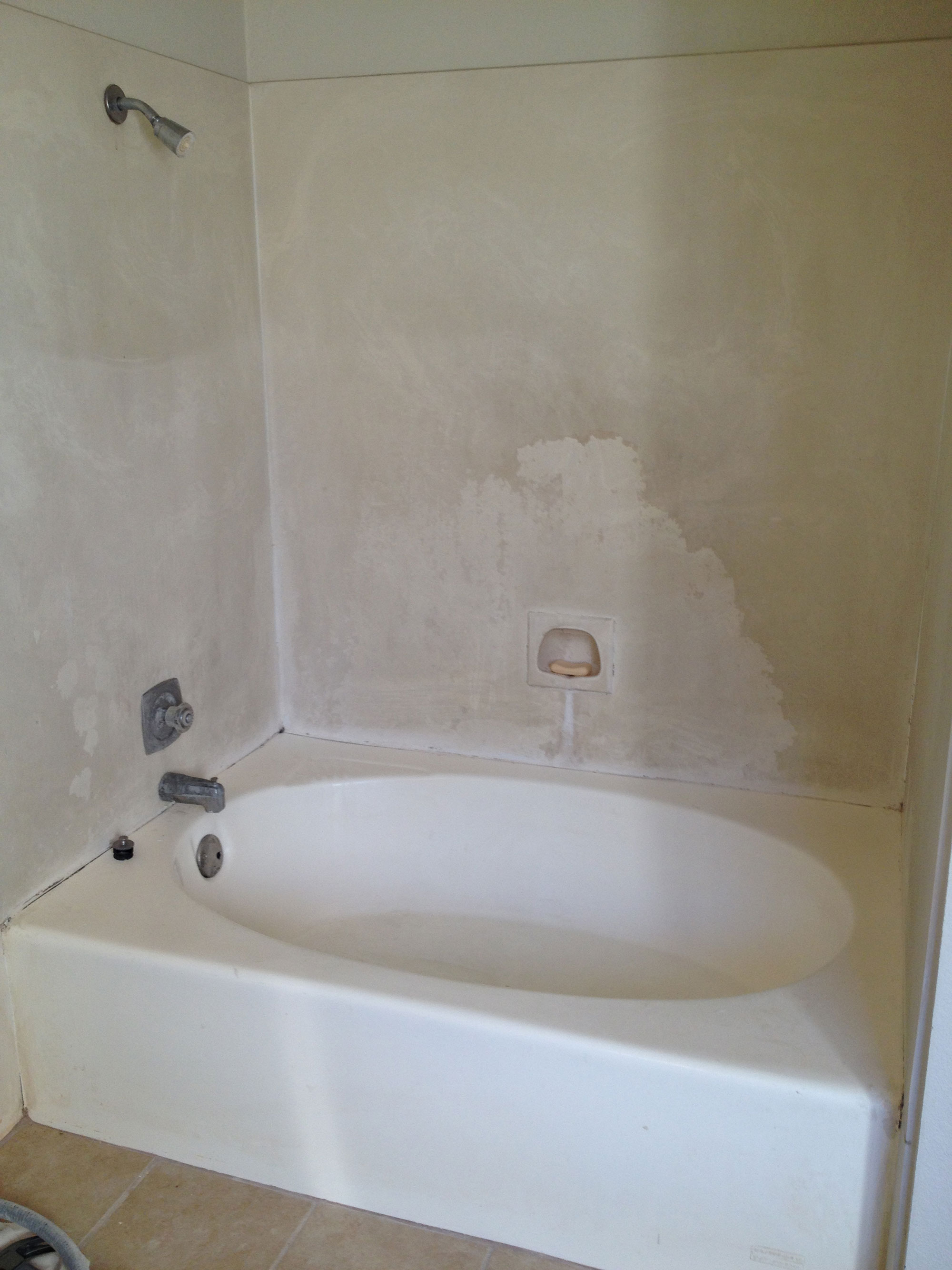 Oval-Shaped Bathtub Before Remodel